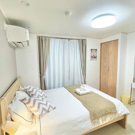 Kosumosu Hotel Tokyo Bagian luar foto