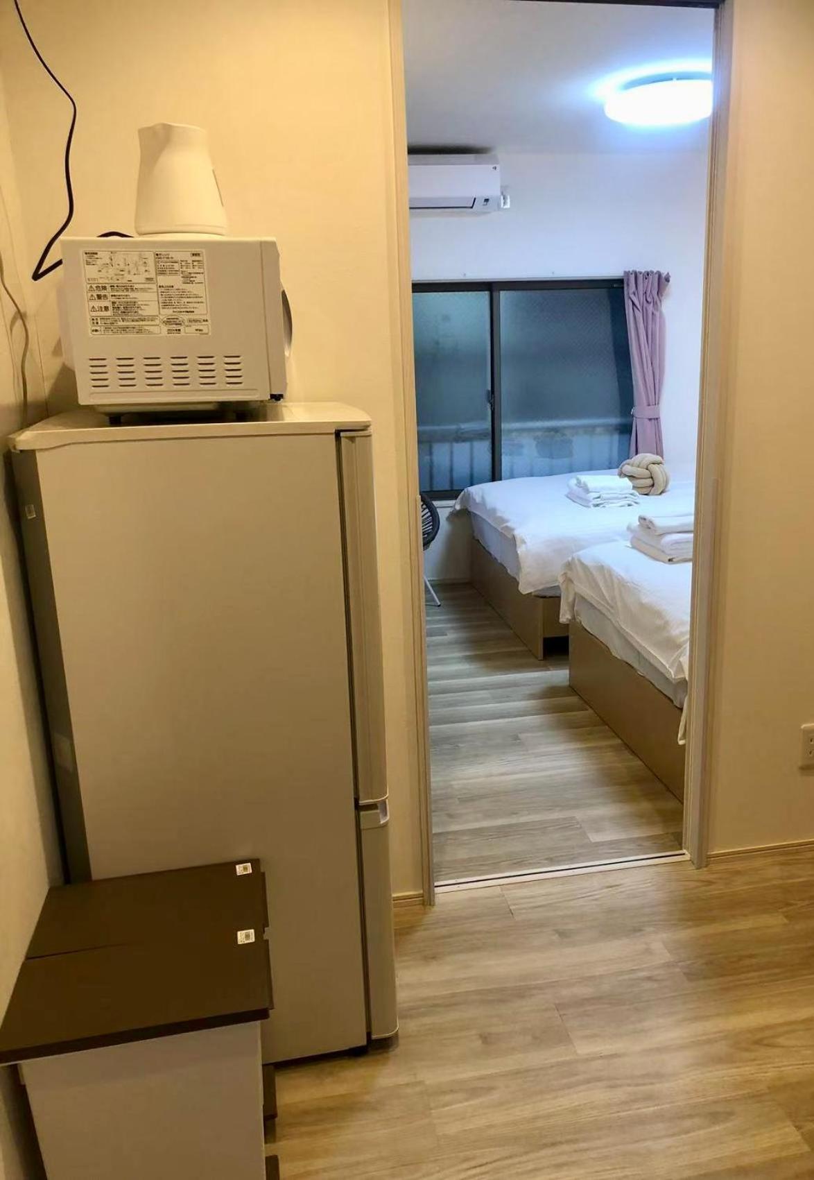 Kosumosu Hotel Tokyo Bagian luar foto
